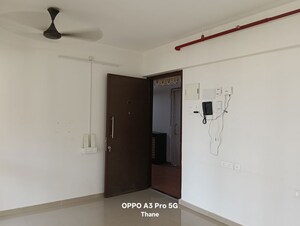 Living Room in 1 BHK Apartment at Puraniks Tokyo Bay, Kasarvadavali – for Rent