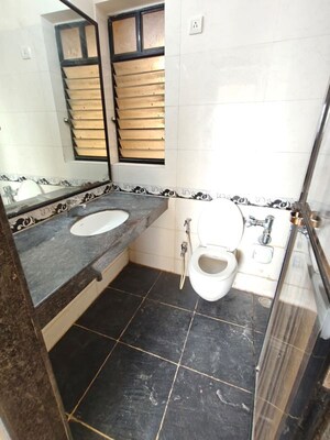 Bathroom in 2 BHK Apartment at K Raheja Heights, Malad East – for Rent