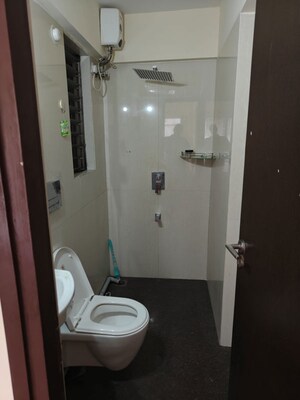 Bathroom in 1 BHK Apartment at Ruparel Elara, Kandivali West – for Rent