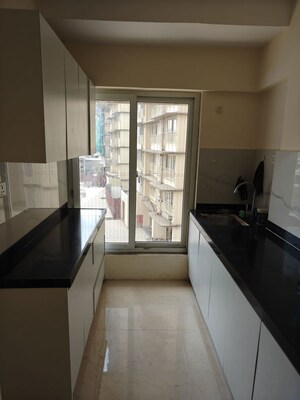Kitchen in 1 BHK Apartment at Ruparel Elara, Kandivali West – for Rent