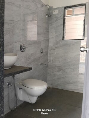 Bathroom in 2 BHK Apartment at Anant Metropolis Insignia Towers, Kasarvadavali – for Rent