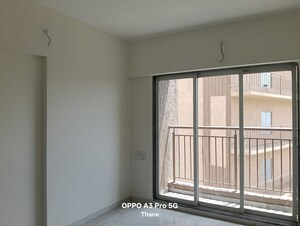 Bedroom in 2 BHK Apartment at Anant Metropolis Insignia Towers, Kasarvadavali – for Rent