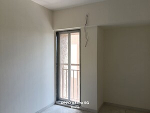 Bedroom in 2 BHK Apartment at Anant Metropolis Insignia Towers, Kasarvadavali – for Rent