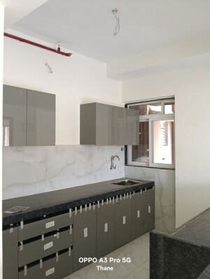 Kitchen in 2 BHK Apartment at Anant Metropolis Insignia Towers, Kasarvadavali – for Rent
