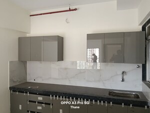 Kitchen in 2 BHK Apartment at Anant Metropolis Insignia Towers, Kasarvadavali – for Rent