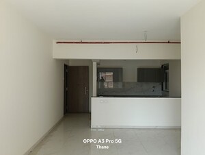 Living Room in 2 BHK Apartment at Anant Metropolis Insignia Towers, Kasarvadavali – for Rent