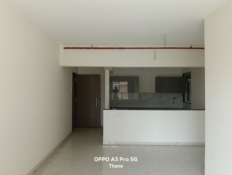 Living Room, anant-metropolis-insignia-towers 2 Bedroom 666 Sq.Ft. Apartment In Kasarvadavali Thane 10428826