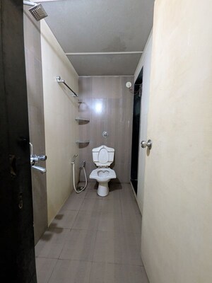 Bathroom in 2 BHK Apartment at Nisarg Hyde Park, Kharghar – for Rent