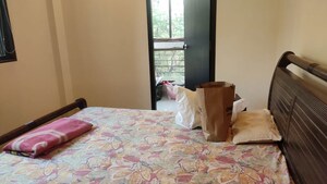 Bedroom in 2 BHK Apartment at Mota Mahal Apartment, Andheri West – for Rent
