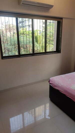 Bedroom in 2 BHK Apartment at Mota Mahal Apartment, Andheri West – for Rent