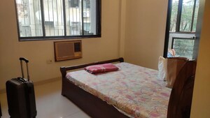 Bedroom in 2 BHK Apartment at Mota Mahal Apartment, Andheri West – for Rent