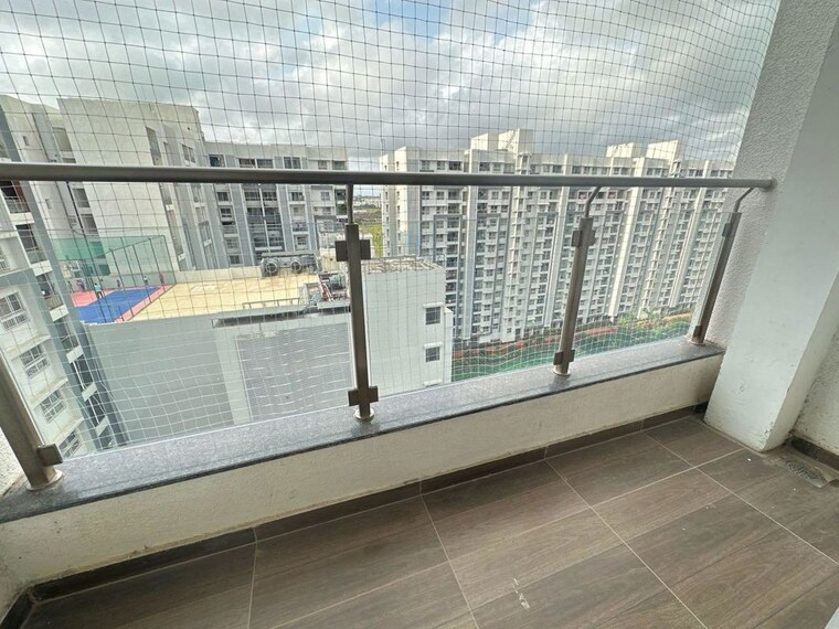Balcony, gera-world-of-joy 2.5 Bedroom 950 Sq.Ft. Apartment In Kharadi Pune 10429161