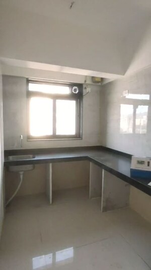 Kitchen in 2.5 BHK Apartment at Gurukripa Building, Chembur – for Rent