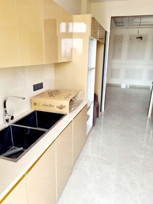 Kitchen in 2.5 BHK Apartment at Smart World Gems, Sector 89 – for Rent