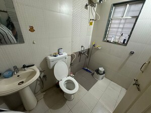Bathroom in 2 BHK Apartment at Pimple Saudagar – for Rent