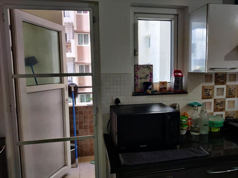 Kitchen, aparna-cyber-life 3 Bedroom 1805 Sq.Ft. Apartment In Nallagandla Hyderabad 10429596