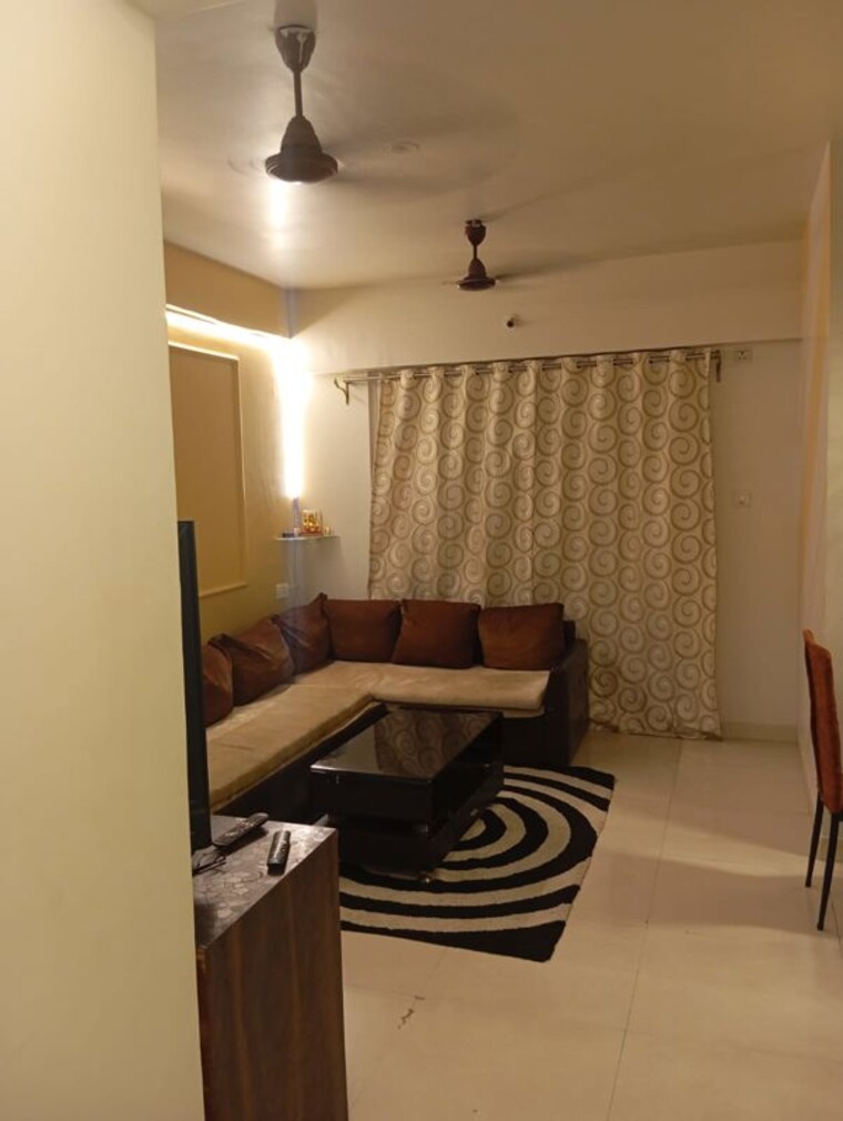 Living Room, rdc-woods-teakwoods 2 Bedroom 650 Sq.Ft. Apartment In Ghodbunder Road Thane 10429589