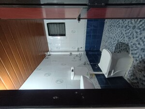 Bathroom in 3 BHK Apartment at Tulja Bhavani CHS, Kopar Khairane – for Rent
