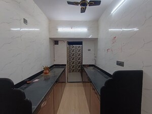Kitchen in 3 BHK Apartment at Tulja Bhavani CHS, Kopar Khairane – for Rent
