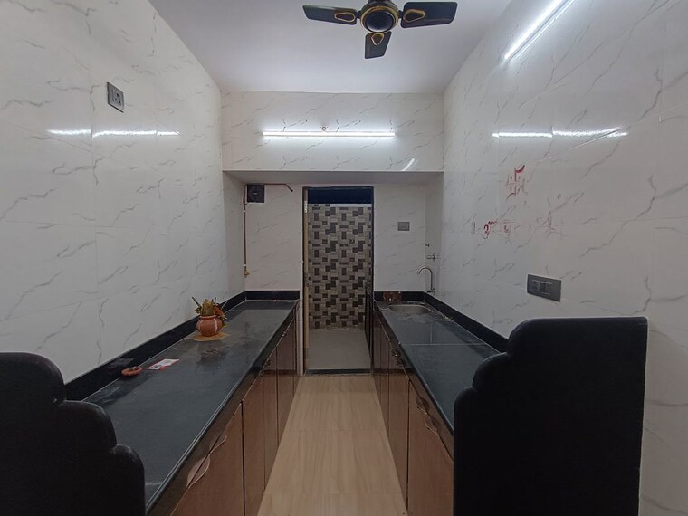Kitchen, tulja-bhavani-chs 3 Bedroom 1200 Sq.Ft. Apartment In Kopar Khairane Navi Mumbai 10429654