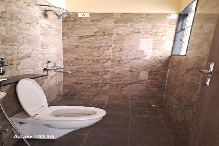 Bathroom, karan-park 1 Bedroom 589 Sq.Ft. Apartment In Wadgaon Sheri Pune 10429716