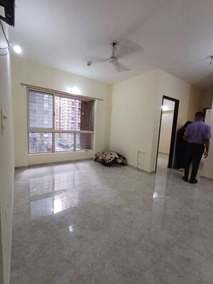 Living Room in 2 BHK Apartment at Lodha Amara, Kolshet Road – for Rent