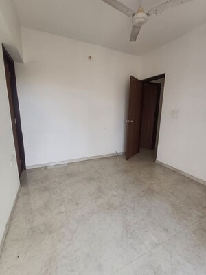 Living Room in 2 BHK Apartment at Lodha Amara, Kolshet Road – for Rent