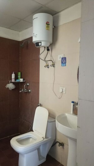 Bathroom in 2 BHK Apartment at Aims Golf Avenue I, Sector 75 – for Rent