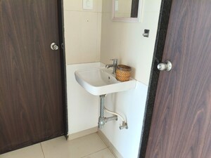 Bathroom in 1 BHK Apartment at Shapoorji Pallonji Joyville Hinjewadi, Hinjewadi – for Rent