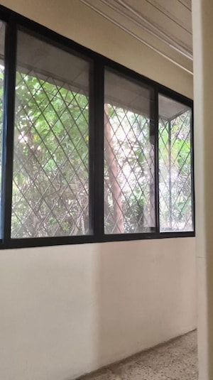 Room in 2 BHK Apartment at Devi Savitri Apartments, Law College Road – for Rent