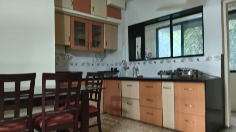 Kitchen, devi-savitri-apartments 2 Bedroom 1200 Sq.Ft. Apartment In Law College Road Pune 10429898