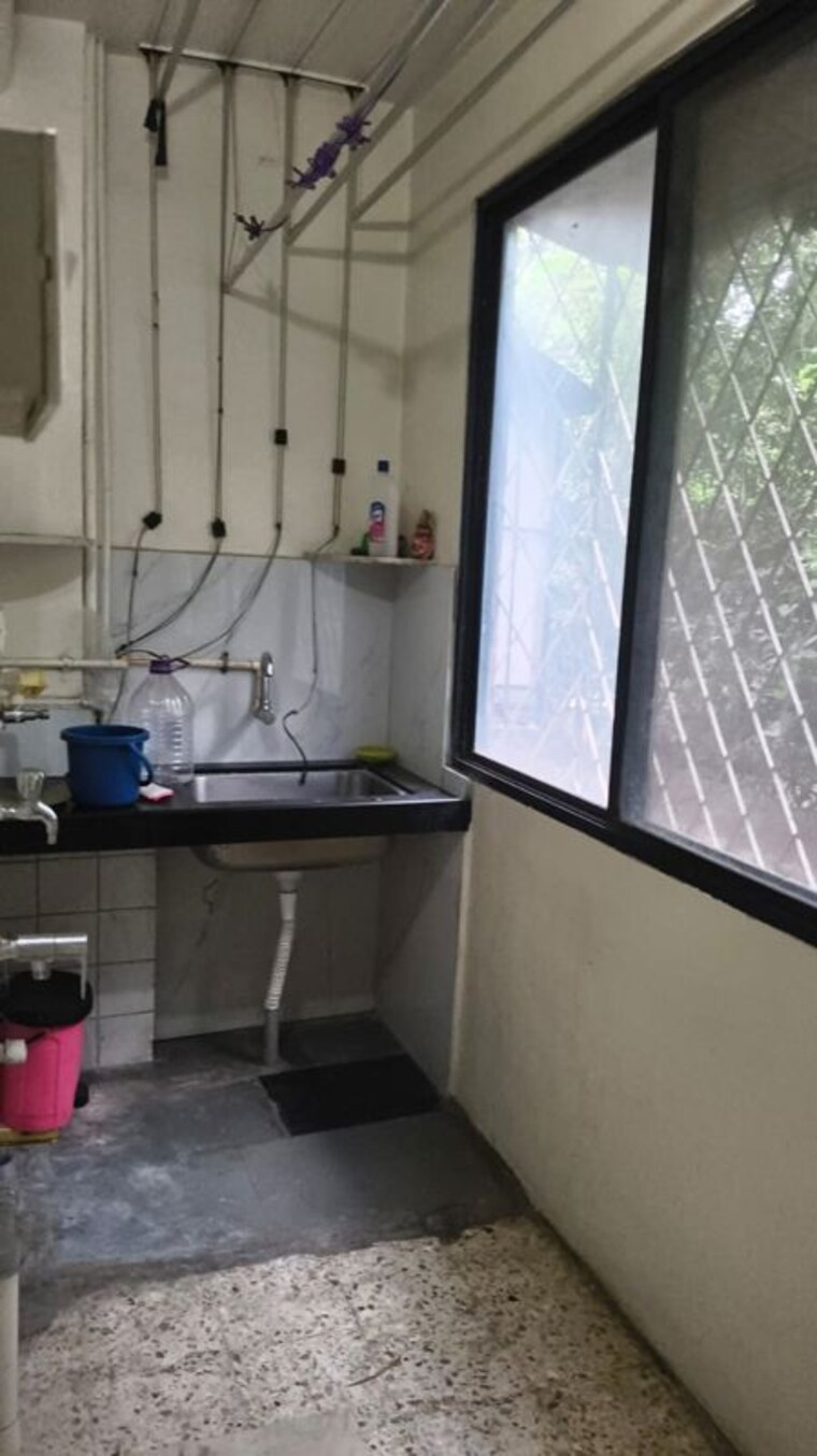 Kitchen, devi-savitri-apartments 2 Bedroom 1200 Sq.Ft. Apartment In Law College Road Pune 10429898