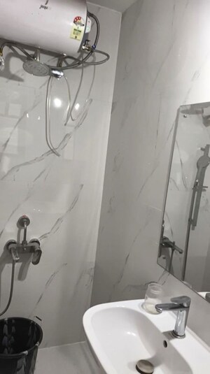 Bathroom in 2 BHK Apartment at Devi Savitri Apartments, Law College Road – for Rent