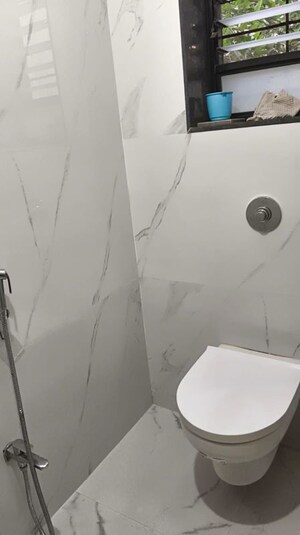 Bathroom in 2 BHK Apartment at Devi Savitri Apartments, Law College Road – for Rent