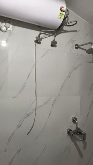 Bathroom in 2 BHK Apartment at Devi Savitri Apartments, Law College Road – for Rent