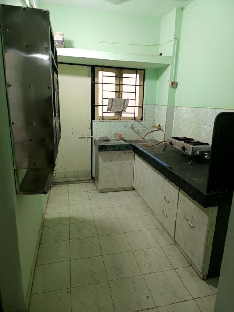 Kitchen, satellite 2 Bedroom 250 Sq.Ft. Apartment In Satellite Ahmedabad 10429908