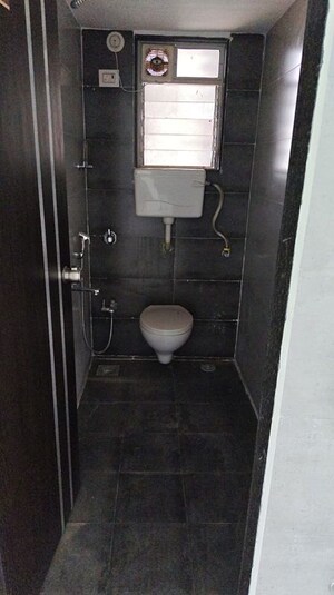 Bathroom in 1 BHK Apartment at Versatile Omkar Heights, Dombivli East – for Rent