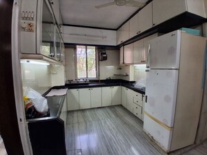 Kitchen in 2 BHK Apartment at Uma Sadan Chembur, Chembur – for Rent