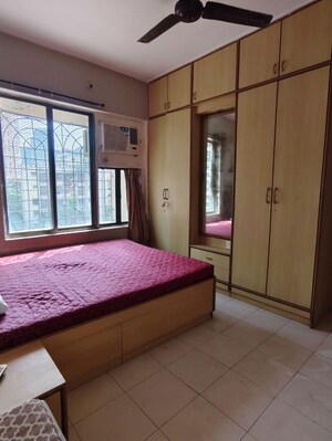 Bedroom in 2 BHK Apartment at Arpan Darpan CHS, Goregaon East – for Rent