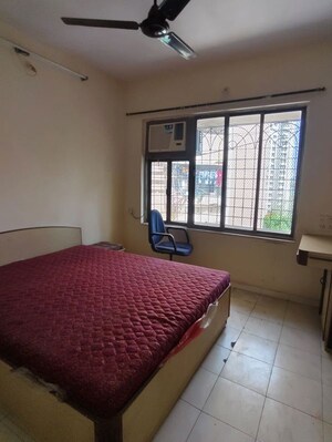 Bedroom in 2 BHK Apartment at Arpan Darpan CHS, Goregaon East – for Rent