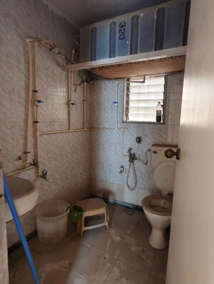 Bathroom in 2 BHK Apartment at Arpan Darpan CHS, Goregaon East – for Rent