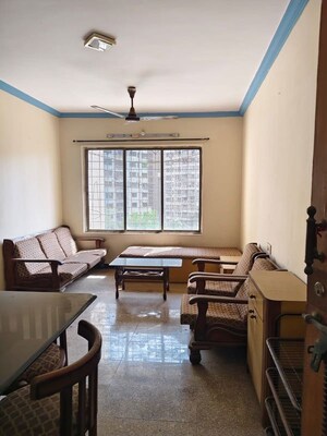 Living Room in 2 BHK Apartment at Arpan Darpan CHS, Goregaon East – for Rent