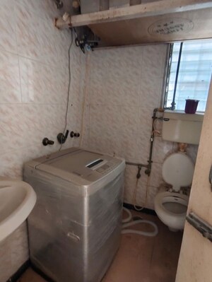 Bathroom in 2 BHK Apartment at Arpan Darpan CHS, Goregaon East – for Rent