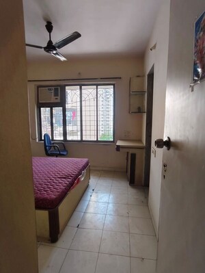 Room in 2 BHK Apartment at Arpan Darpan CHS, Goregaon East – for Rent