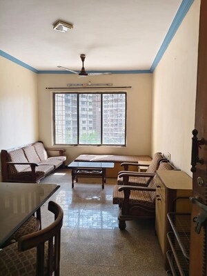 Living Room in 2 BHK Apartment at Arpan Darpan CHS, Goregaon East – for Rent