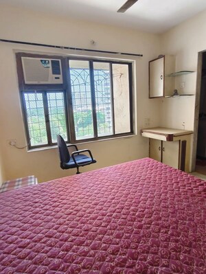Bedroom in 2 BHK Apartment at Arpan Darpan CHS, Goregaon East – for Rent