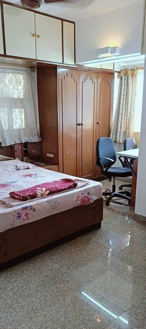 Bedroom in 2 BHK Apartment at Manish Lotus CHS, Andheri West – for Rent