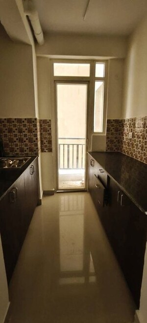 Kitchen in 2.5 BHK Apartment at Gaur City 2 - 12th Avenue, Sector 16c Greater Noida – for Rent