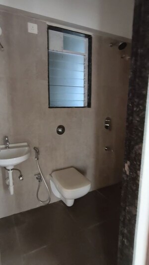 Bathroom in 2 BHK Apartment at Triumph Omkareshwar CHS, Borivali East – for Rent