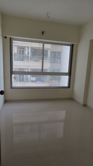 Room in 2 BHK Apartment at Triumph Omkareshwar CHS, Borivali East – for Rent